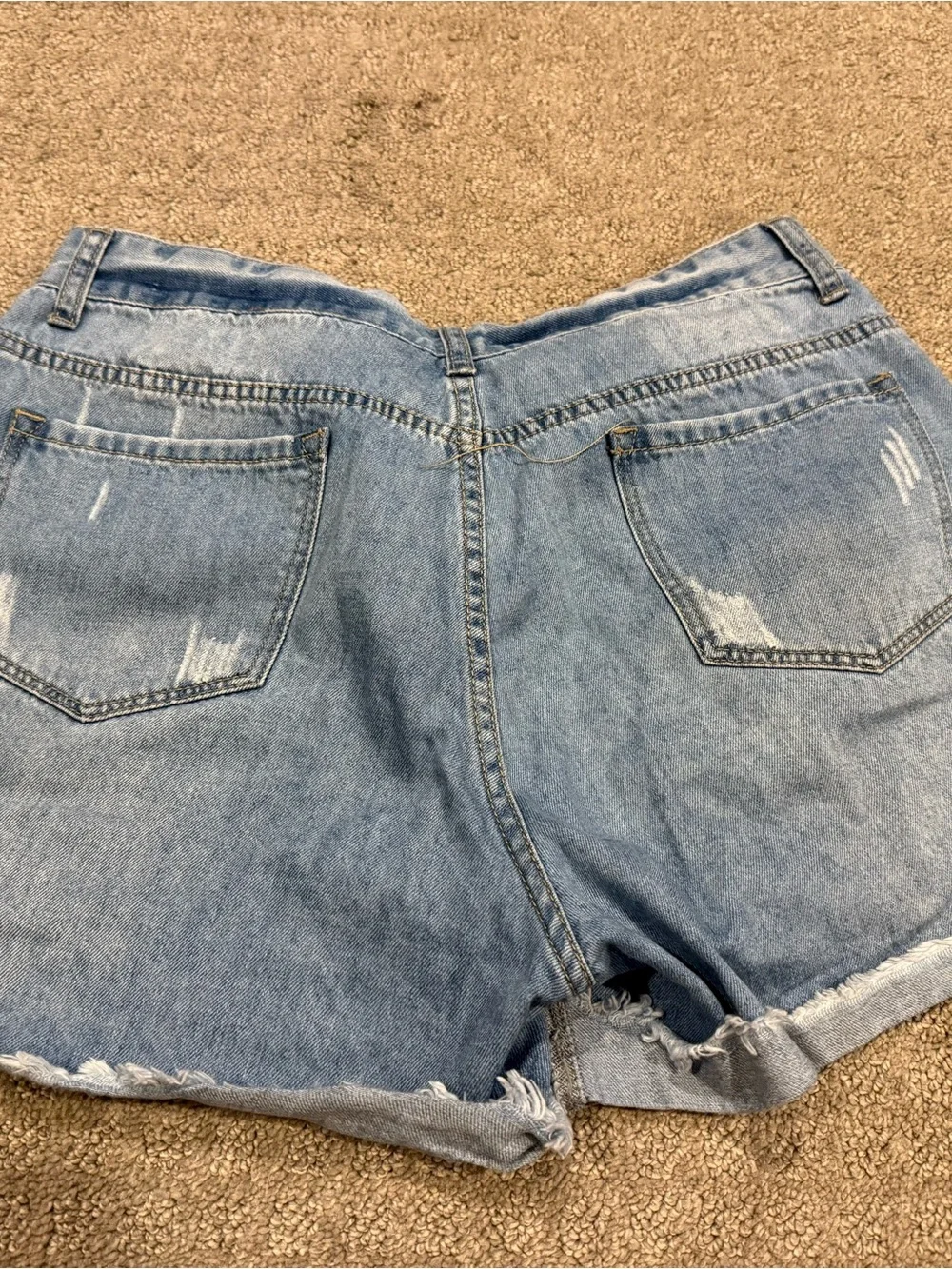 SHEIN Light Blue Ripped Denim Rolled-Hem Shorts